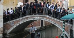 Editorial Use Only - Tourists in the crowded bridge in Venice, Italy