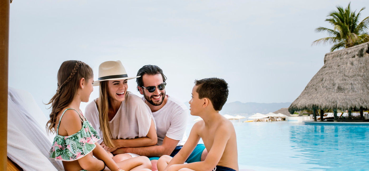 Image: PHOTO: Family time by the pool. (photo via Velas Resorts)