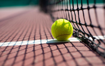 Tennis ball on the court.