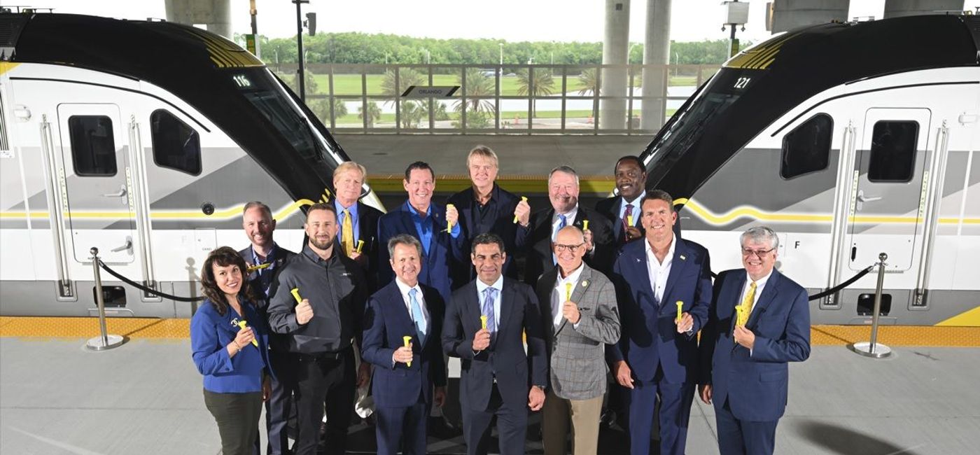 Image: Mayors stand in front of Brightline trains in Orlando. (Photo Credit: Brightline Media)