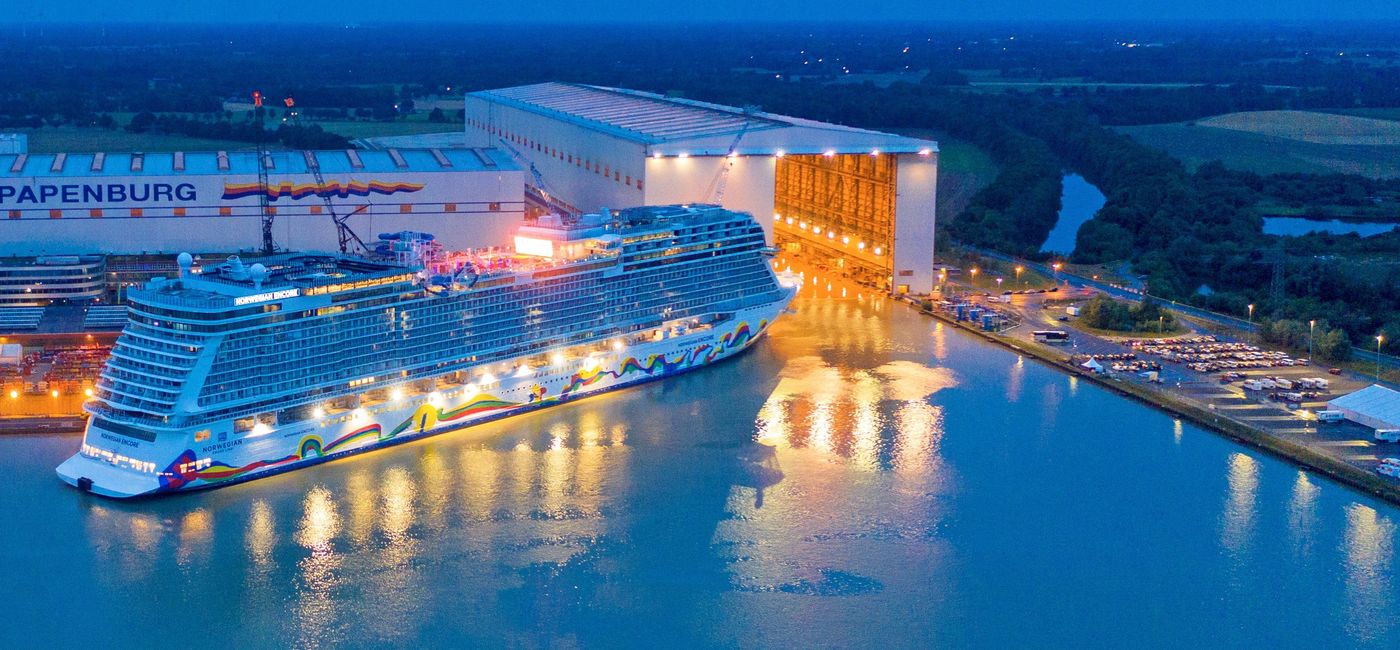 Image: PHOTO: Norwegian Encore emerges from the Meyer Werft shipbuilding dock in Papenburg, Germany. (photo courtesy of Norwegian Cruise Line)