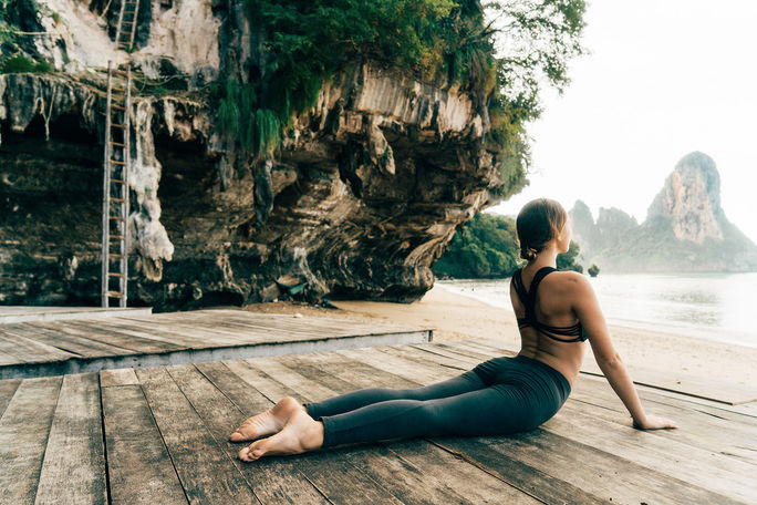 A traveler practicing yoga A traveler practicing yoga