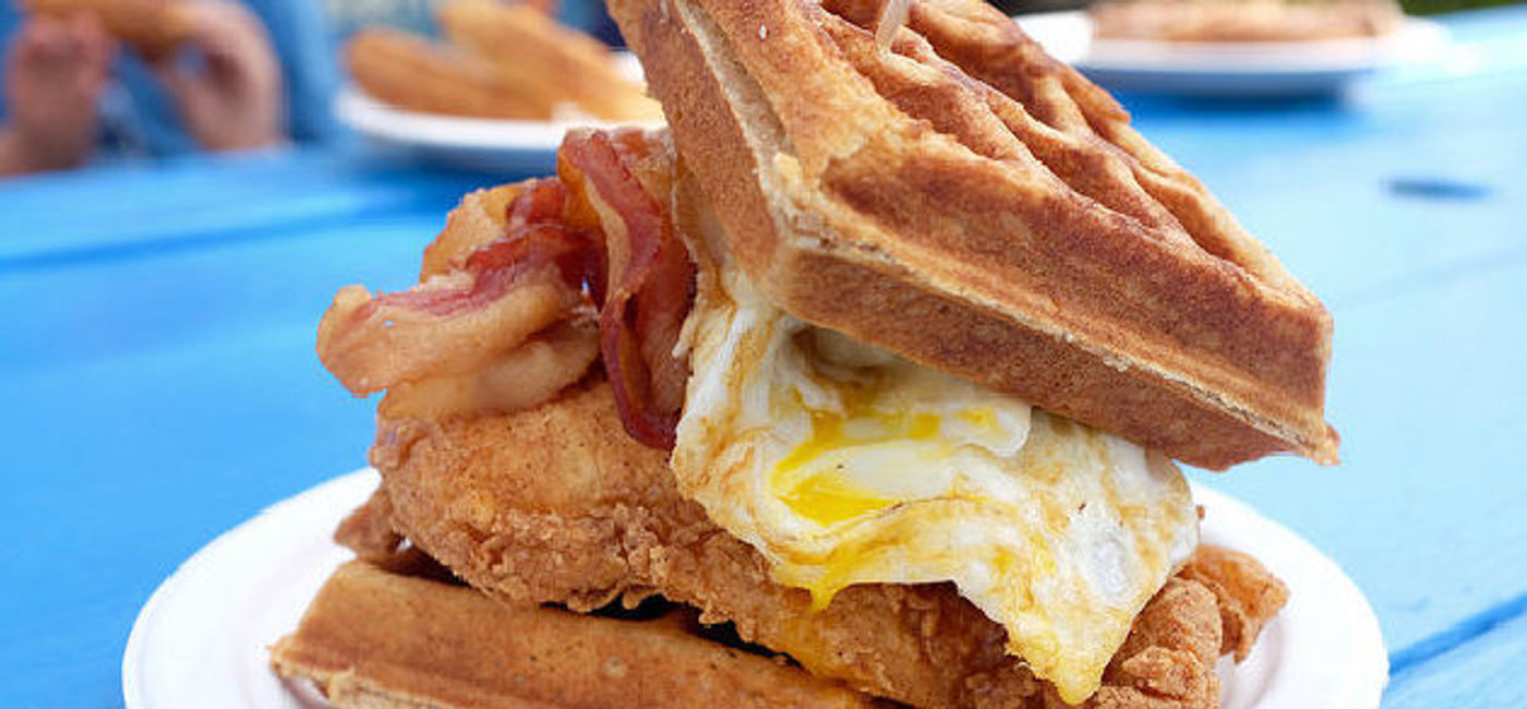 Image: PHOTO:  Chicken and waffles from the Nom Kauai food truck. (photo via Flickr/Peter Burka)