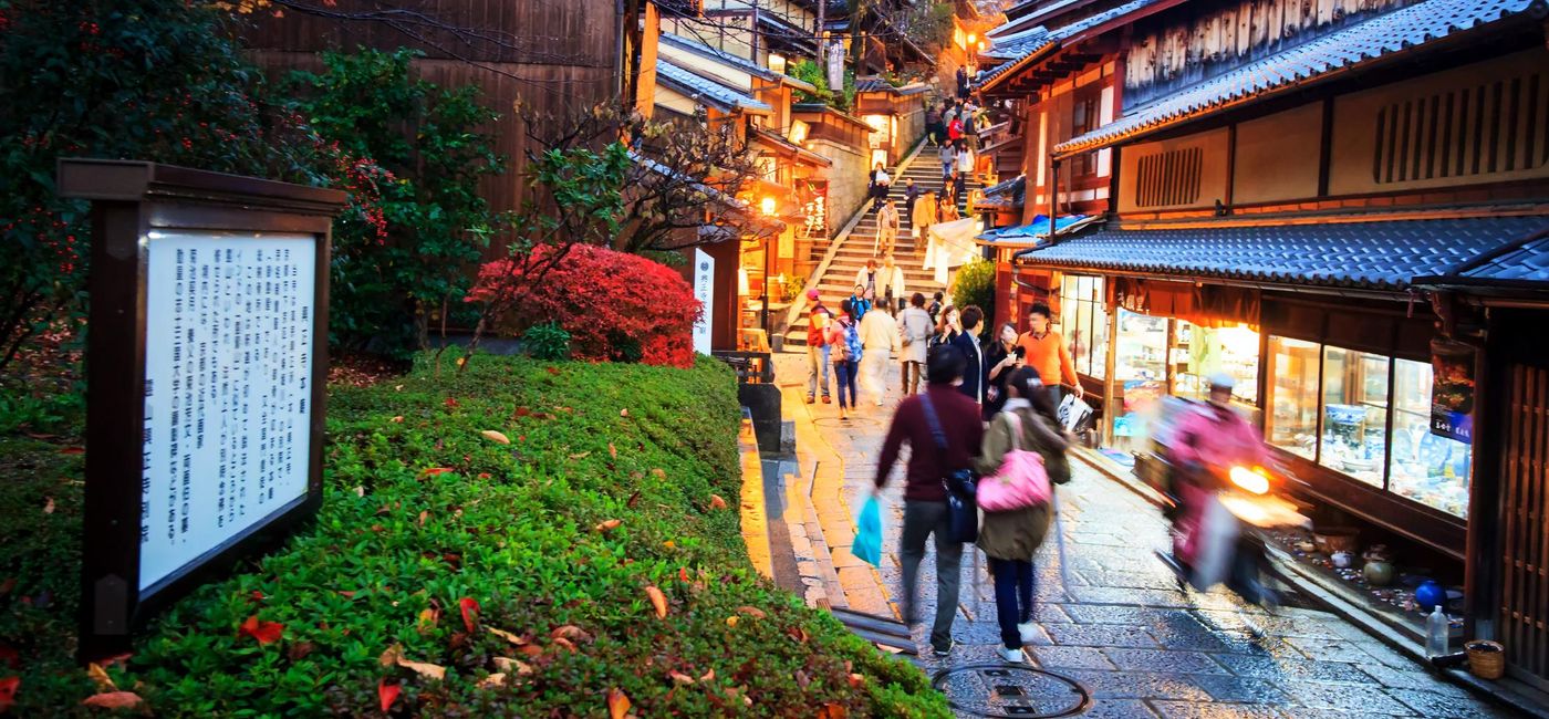 Image: PHOTO: Tourists walk on a street leading to Kiyomizu-dera Temple in Kyoto, Japan. (photo via nicholashan/iStock/Getty Images Plus)