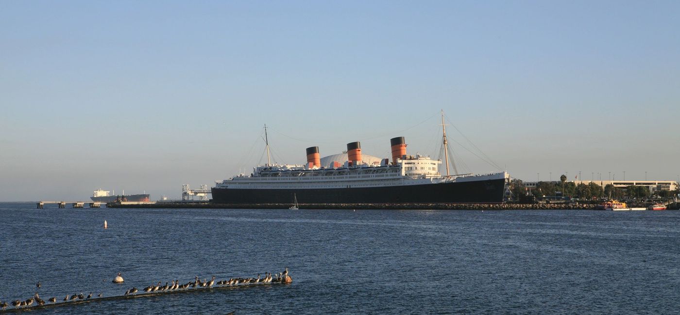 Image: Queen Mary, moored in Long Beach, California. (Photo via iStock / Getty Images Plus / ekash)