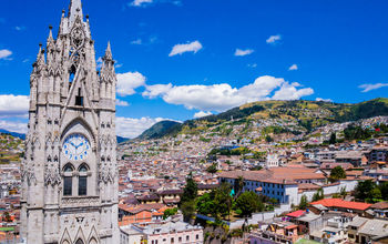 Ecuador, city view of Quito from gothic Basilica del Voto Nacional clock tower