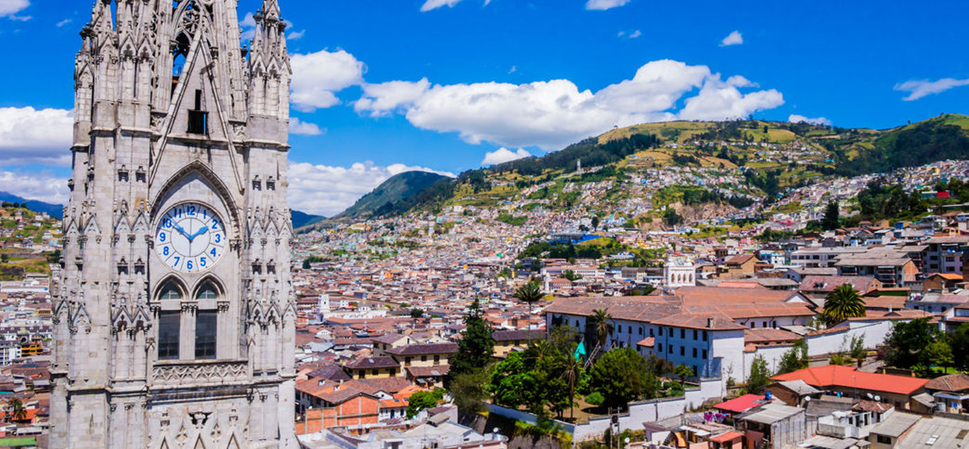 Image: Ecuador, city view of Quito from gothic Basilica del Voto Nacional clock tower (Photo Credit: Photogilio)