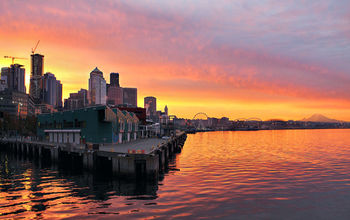 Orange sunrise over the Seattle skyline and waterfront