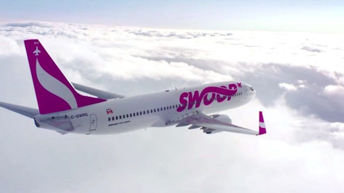 An artist's rendering of a Swoop Boeing 737-800 in flight. WestJet will transfer 10 of these aircraft to the new ULCC.
