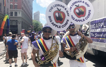 LGBTQ Pride marchers, gay travel,