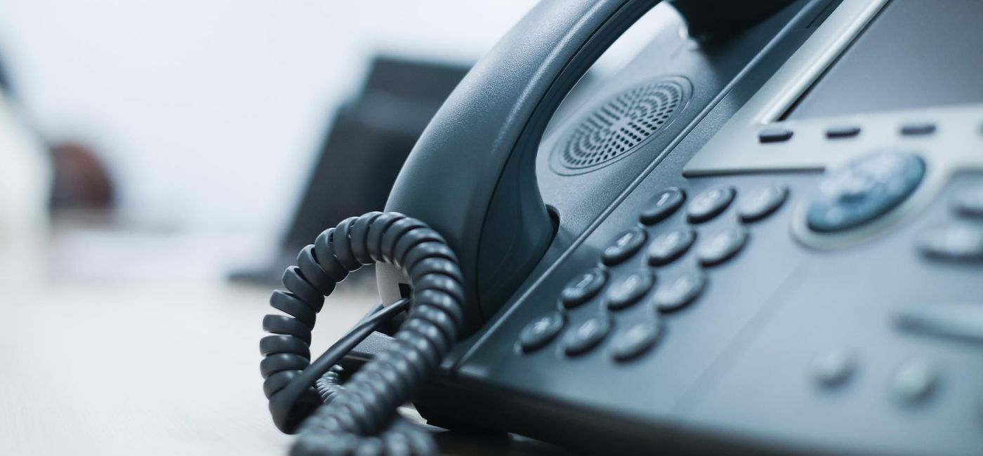 Image: Close-up of an office telephone. (photo via Chainarong Prasertthai/iStock/Getty Images Plus)