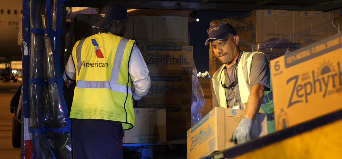 Image: PHOTO: American Airlines employees preparing relief flight. (photo via American Airlines)