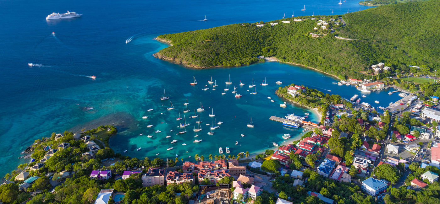 Image: Aerial View of Cruz Bay, St. John in US Virgin Islands (Photo via cdwheatley / Getty Images / E+)