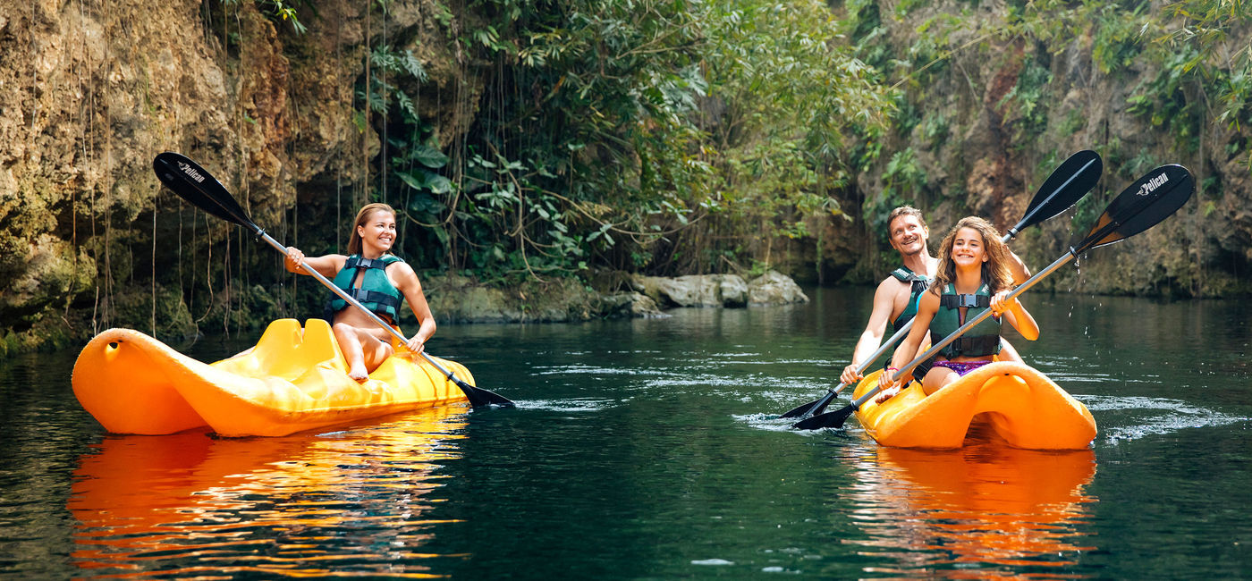 Image: Visitors kayaking in Riviera Maya's naturally occurring freshwater cenotes. (photo courtesy of Grupo Xcaret)