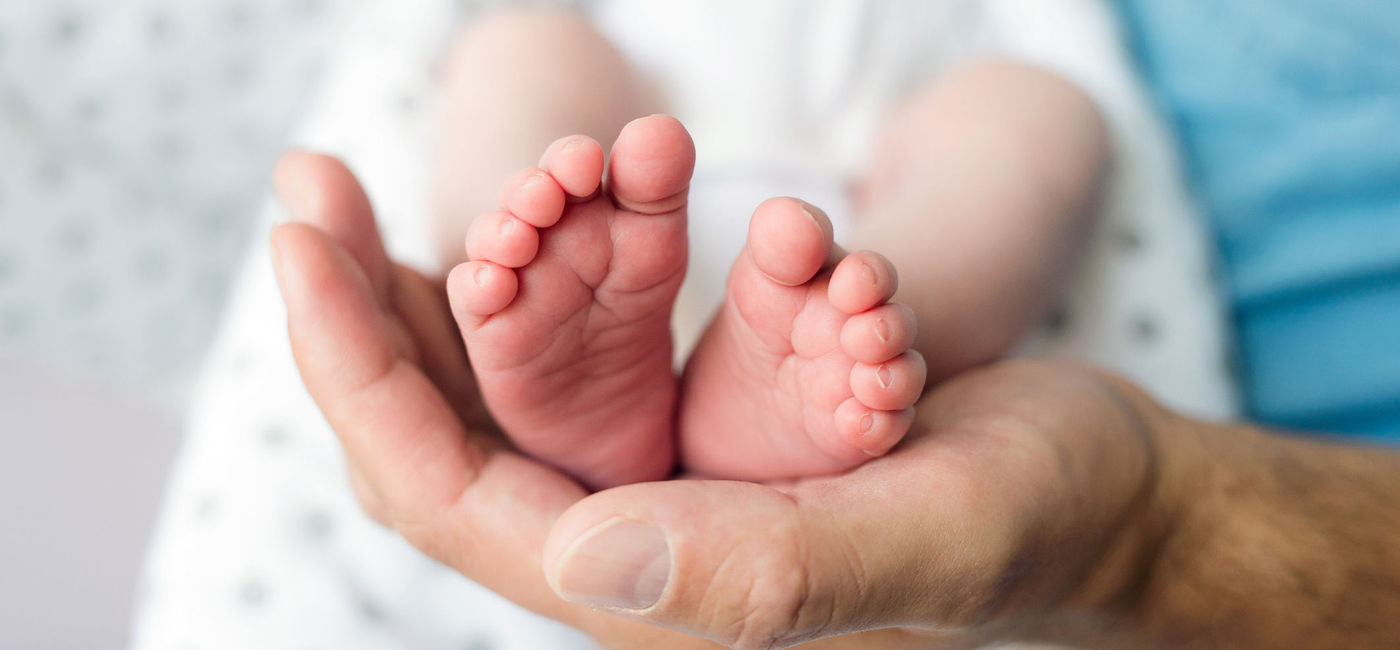Image: Close-up on the feet of a newborn baby. (Photo via iStock/Getty Images Plus/Halfpoint)