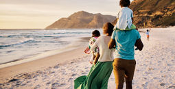 Family enjoying a beach vacation