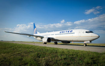 United Airlines Boeing 737 on runway at IAH.
