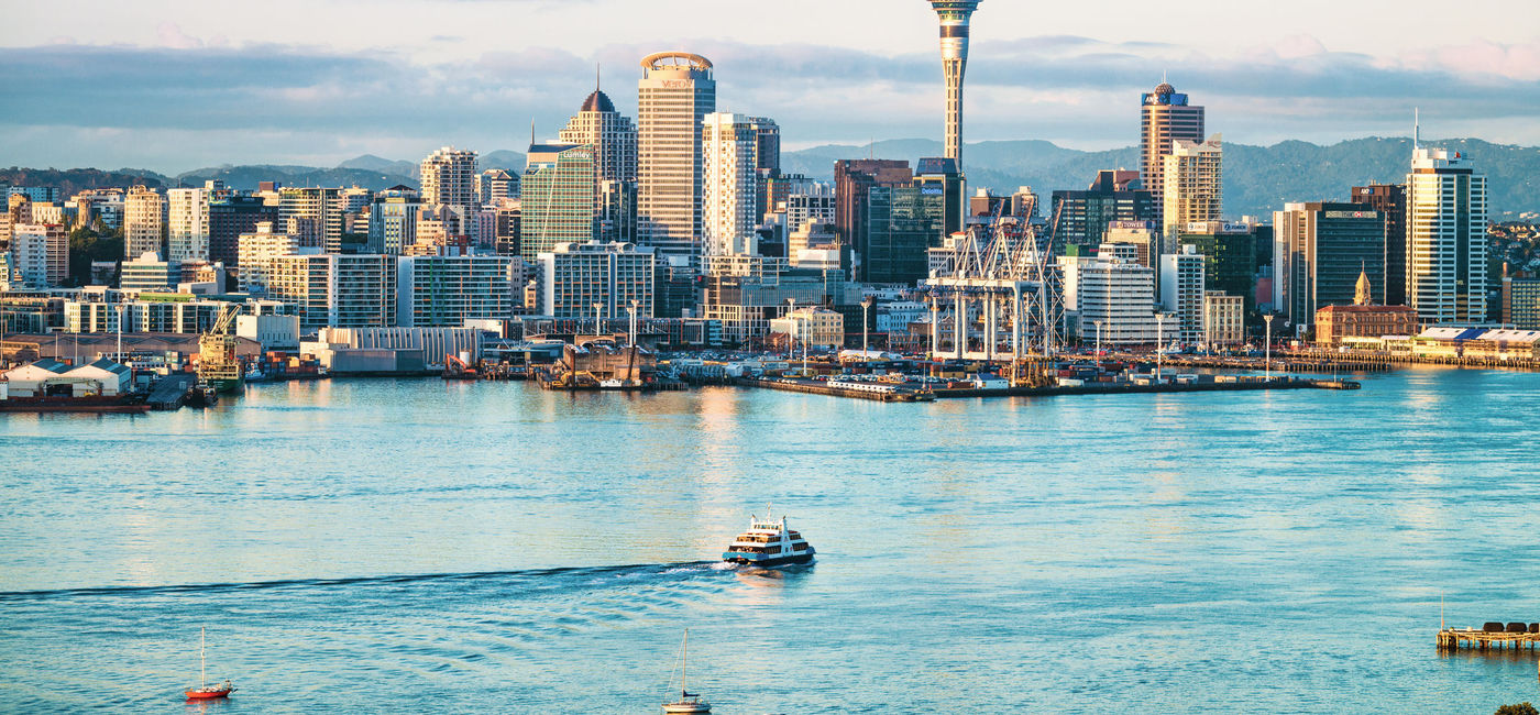 Image: Auckland, New Zealand, skyline at dawn. (photo via (georgeclerk / E+)