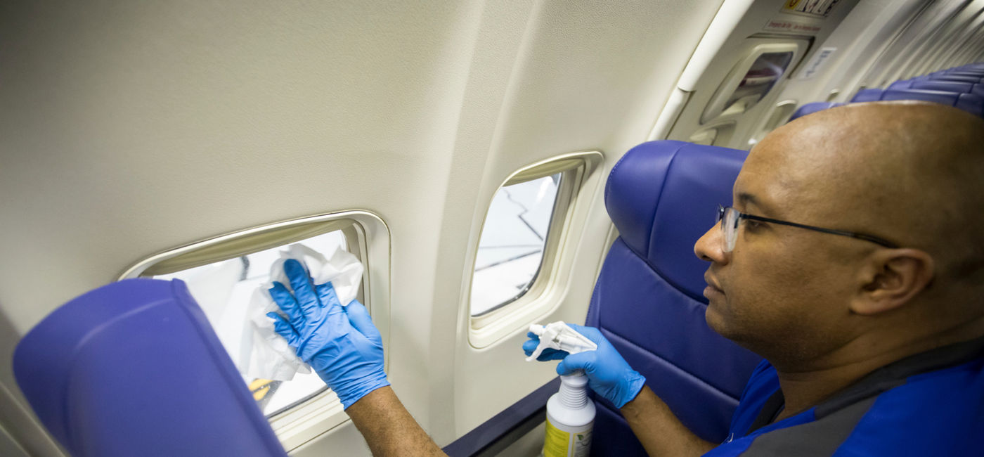 Image: PHOTO: Southwest employee cleaning plane. (photo via Southwest Airlines Media)