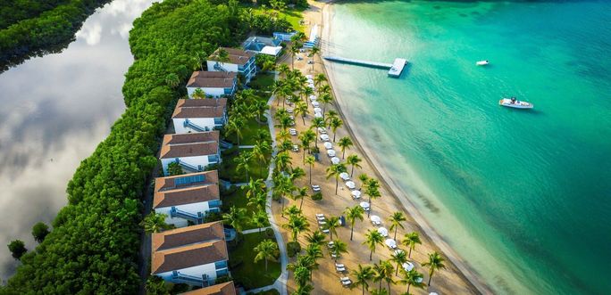 Aerial view of Carlisle Bay Antigua*s beachfront luxury suites. Aerial view of Carlisle Bay Antigua*s beachfront luxury suites.