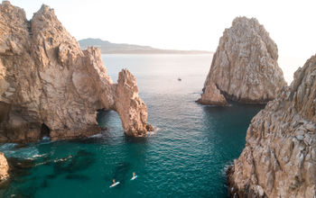 Paddling boarding The Arch in Los Cabos