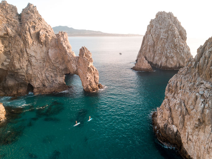 Paddling boarding The Arch in Los Cabos