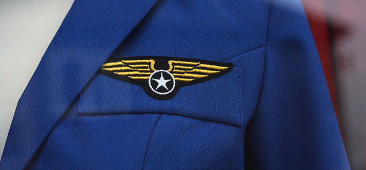 Image: PHOTO: Wings on an air crew uniform. (photo via Flickr/Rob Brewer)