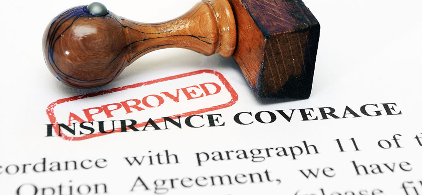 Image: PHOTO: Travel insurance stamp of approval. (photo courtesy of Thinkstock)