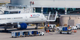 A Delta Air Lines aircraft sits parked at Orlando International Airport