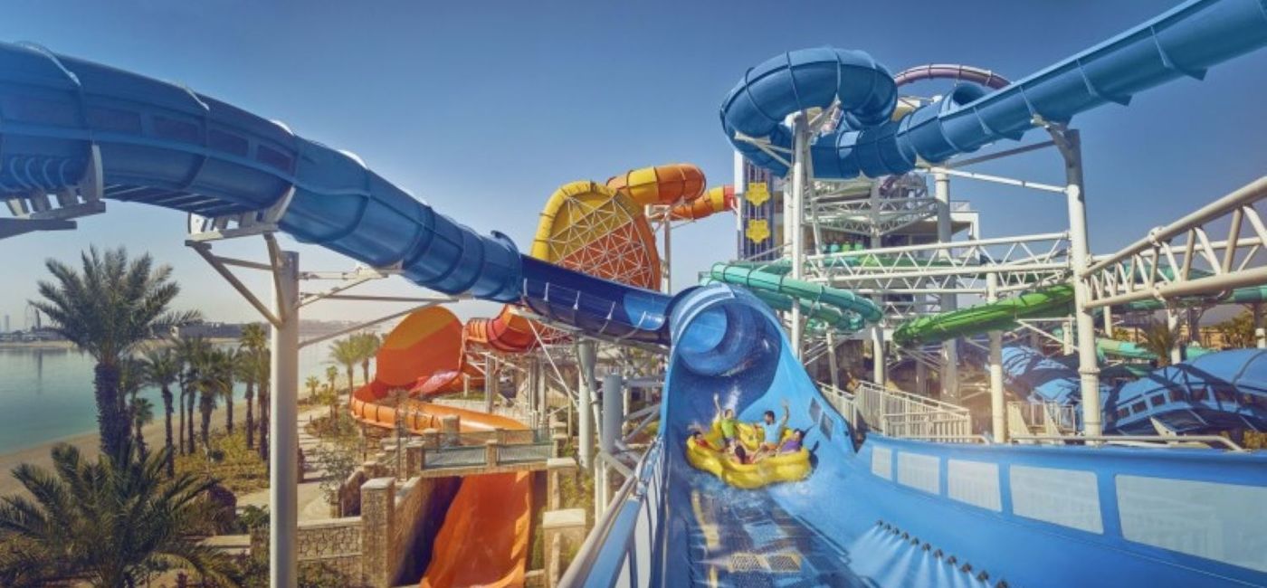 Image: Family going down waterslide at Atlantis Aquaventure (photo via Atlantis Aquaventure) ((photo via Atlantis Aquaventure))