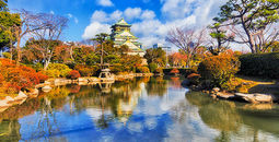 JP Osaka Castle pond during the day.