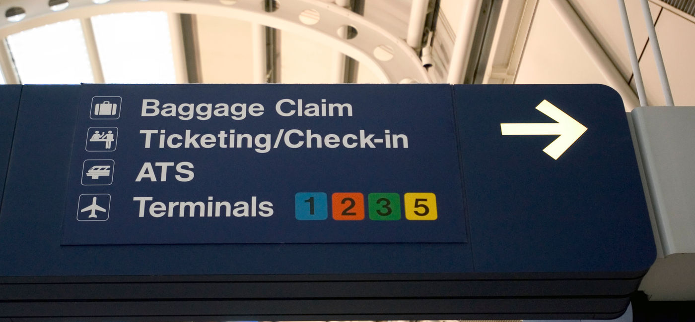 Image: PHOTO: Signage at Chicago O'Hare International Airport, Chicago, IL. (Photo via iStock/Getty Images Plus / Tashka)