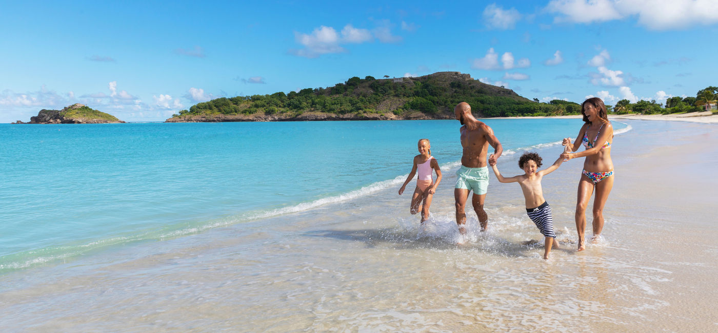 Image: Family enjoying the beach at Royalton Antigua. (photo courtesy Blue Diamond Resorts)