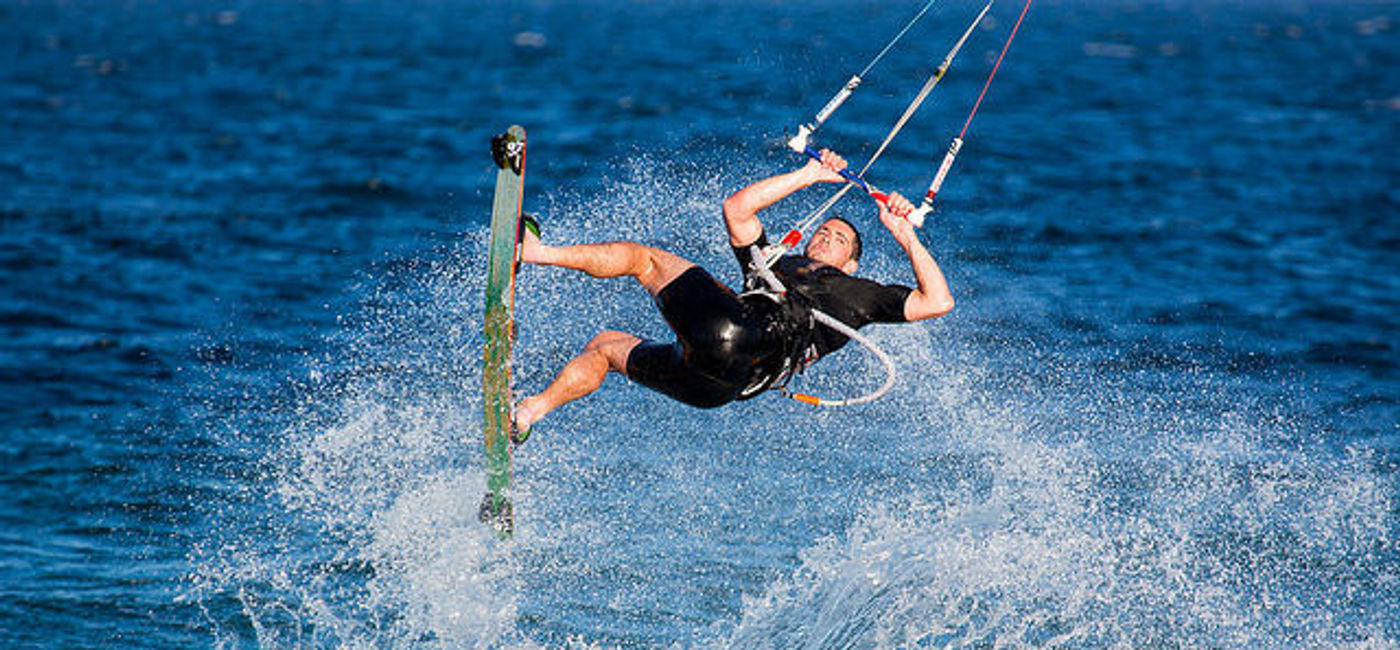 Image: PHOTO: A Man Windsurfing (Flickr, Zach Dischner)