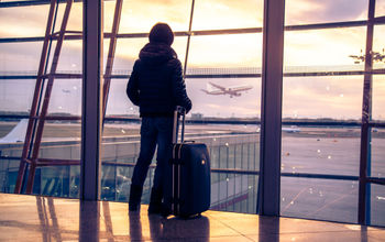 Passenger at airport in Beijing, China.