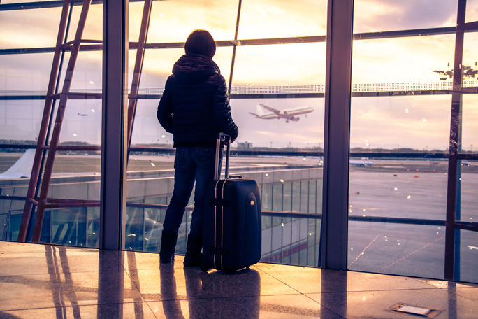 Passenger at airport in Beijing, China.