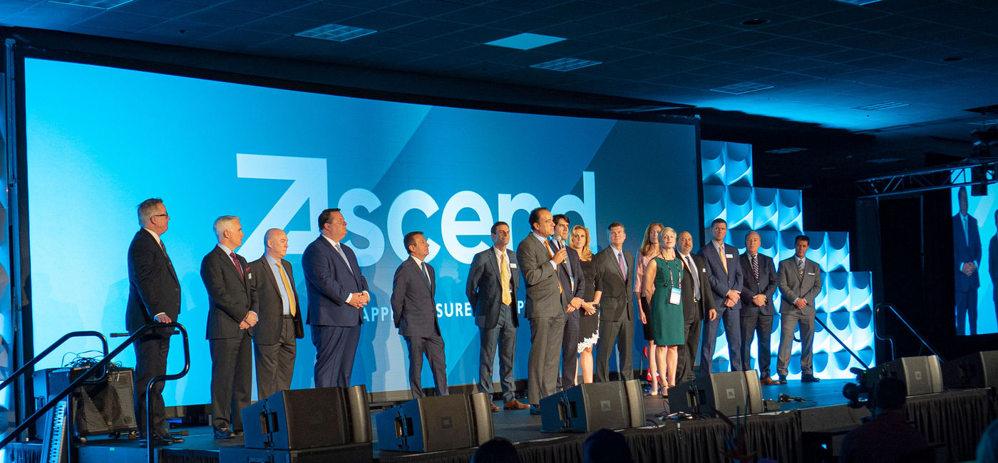 Image: PHOTO: Apple Leisure Group Executive Chairman Alex Zozaya, center, addresses travel agents at the Ascend conference near Philadelphia. (Courtesy of Apple Leisure Group)