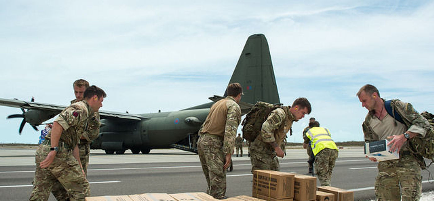 Image: PHOTO: British military personnel unloading aid supplies for Turks and Caicos. (photo via Flickr/DFID/Cpl Darren Legg RLC/MoD Crown) 