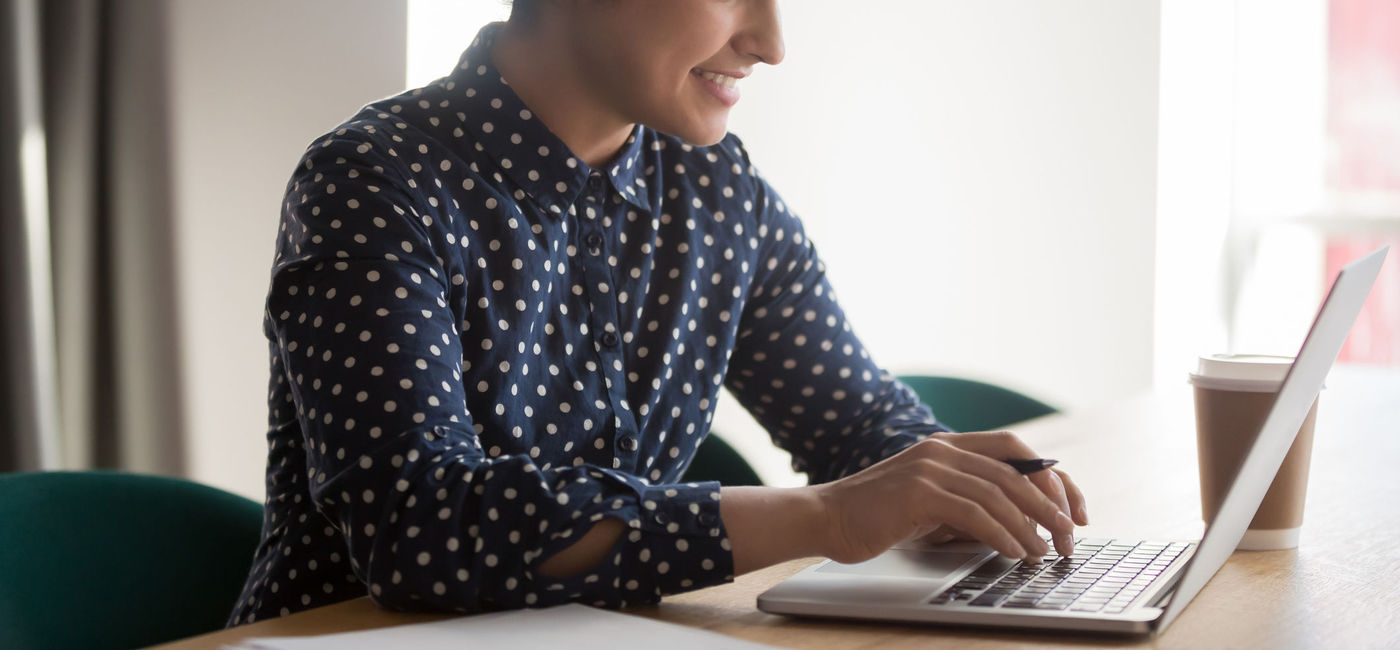 Image: Travel advisor watching a webinar. (photo via fizkes/iStock/Getty Images Plus)