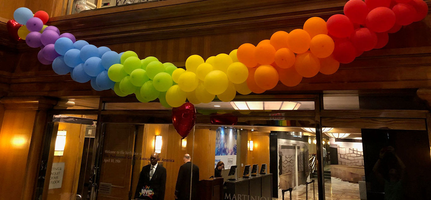 Image: During this summer's World Pride, the Hotel Martinique welcomed guests with a rainbow-colored array of balloons. Photo by Paul Heney. (Photo by Paul Heney.)