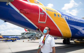 Southwest Airlines Pilot wearing a COVID-era face mask.