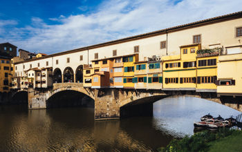 Stroll over the Ponte Vecchio in Florence, Italy