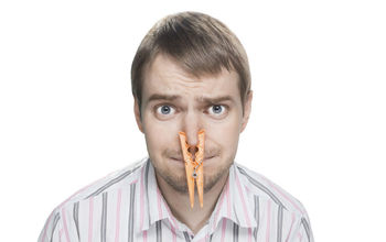 Man with a clothespin