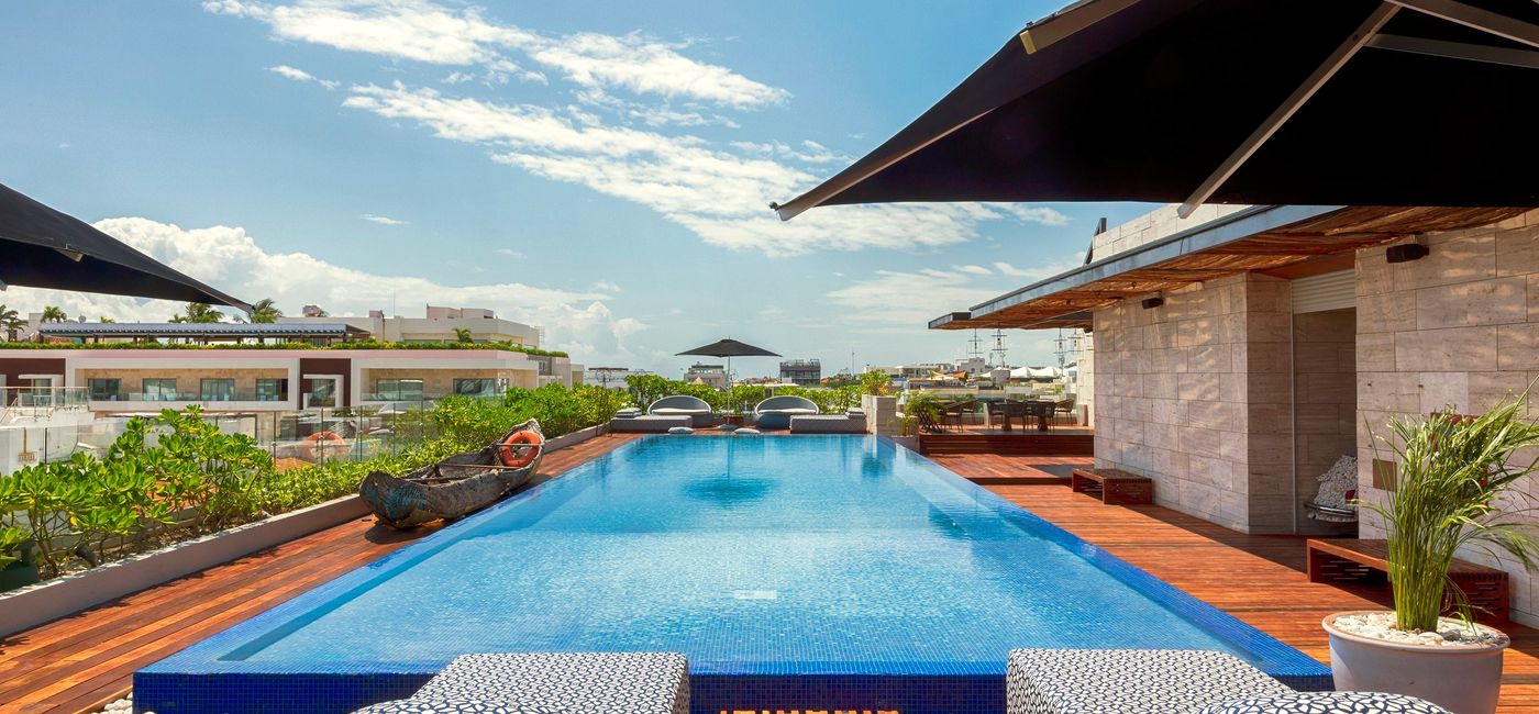 Image: Rooftop pool at The Yucatan Resort Playa del Carmen, Tapestry Collection by Hilton. (photo via Playa Hotels & Resorts)