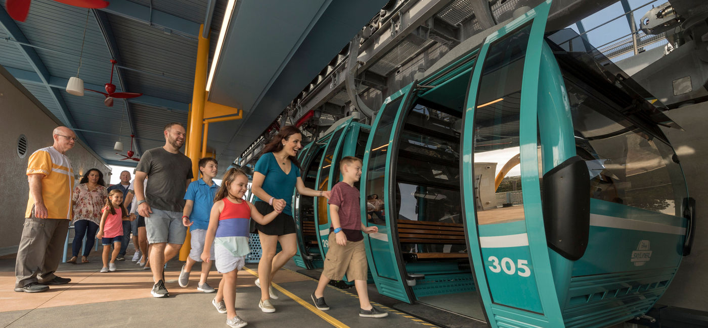 Image: PHOTO: Guests board a Disney Skyliner gondola. (Photo via Walt Disney World Resort)