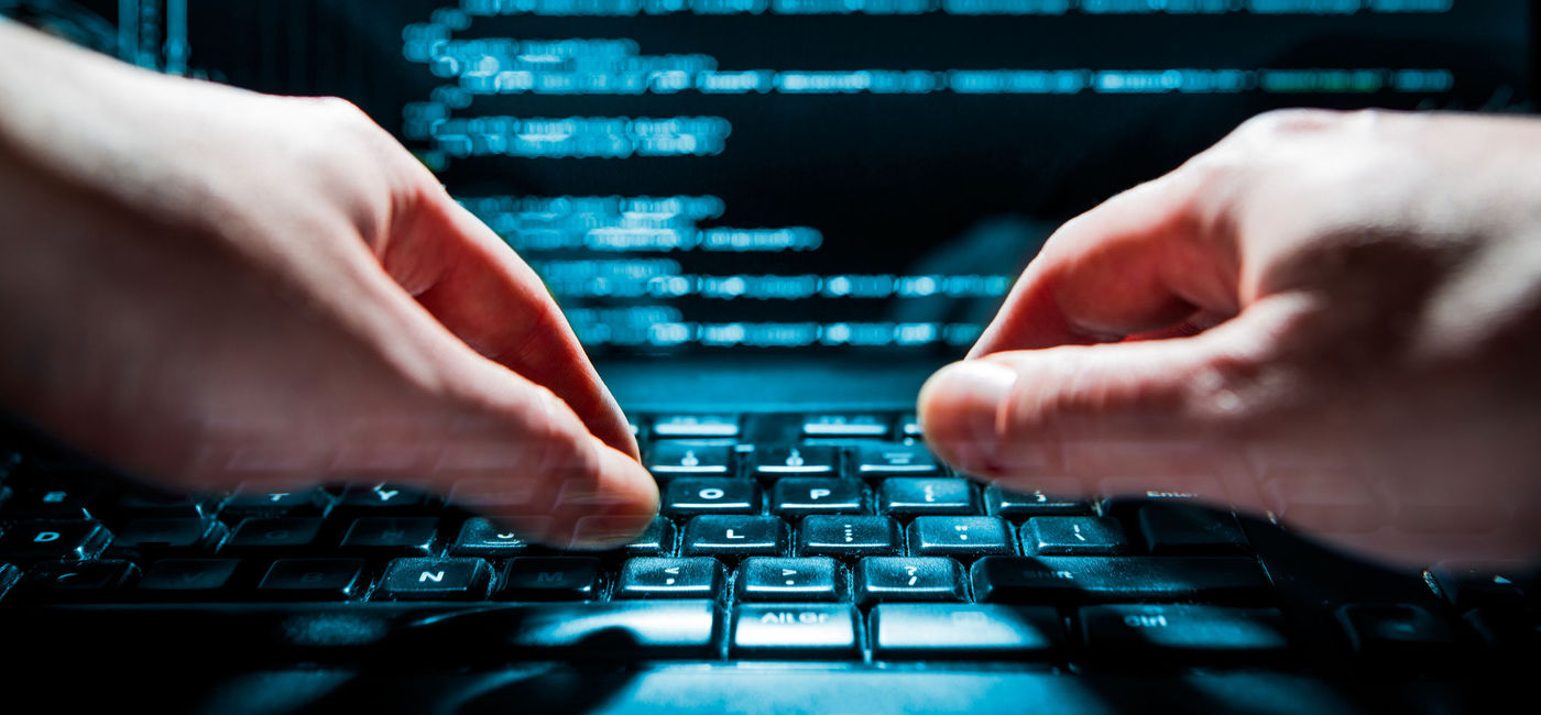 Image: Cyber attacker. (Photo via iStock/Getty Images Plus/scyther5)
