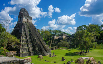Tikal, in Guatemala, is one of the great treasures of the Mayan World.(Photo via: SimonDannhauer/iStock/Getty Images Plus).