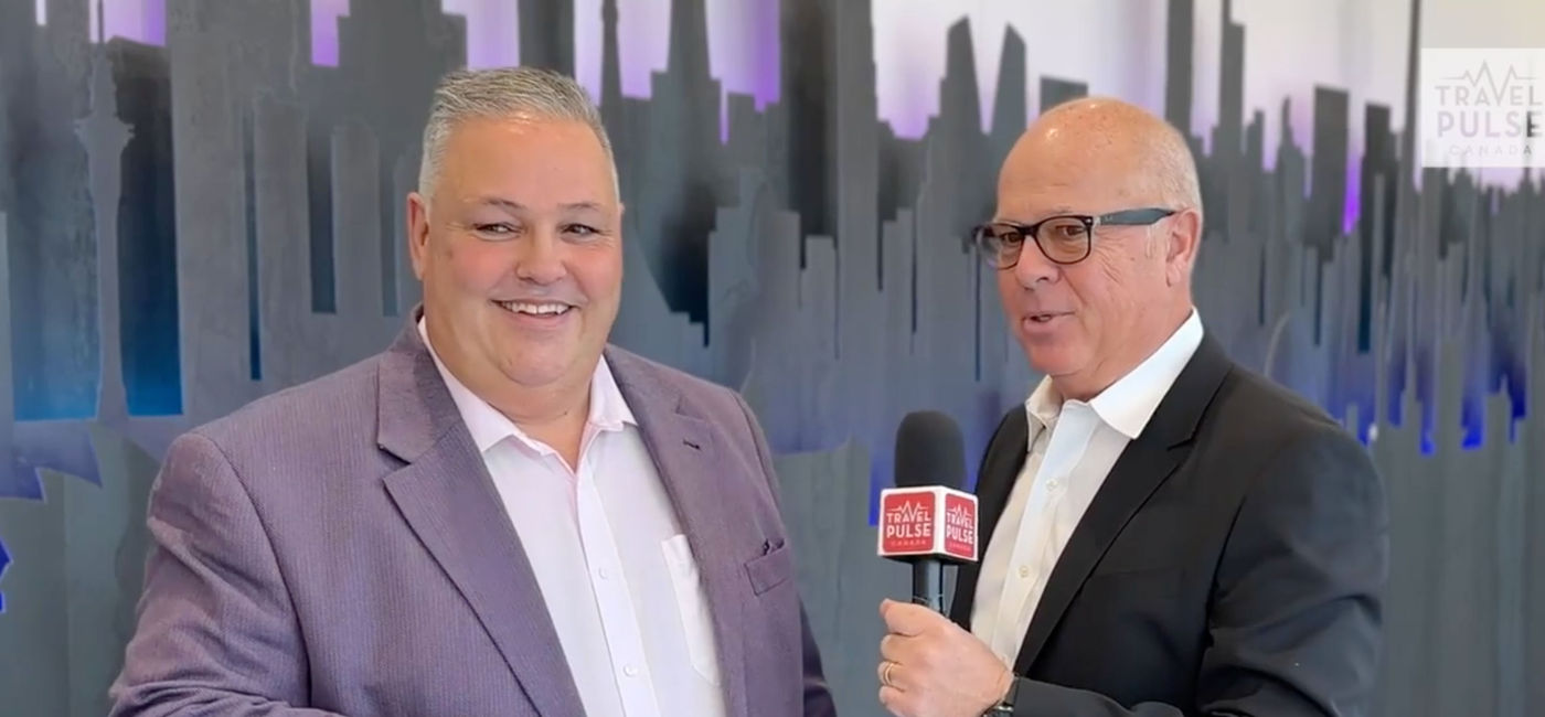 Image: Andrew Dawson shares details of the new Sunwing Vacations Group with TravelPulse Canada's John Kirk. (Photo Credit: John Kirk)