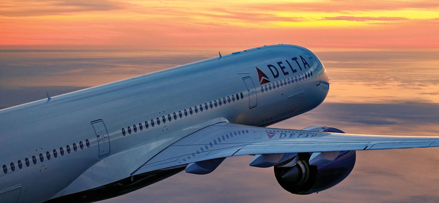 Image: Delta Air Lines plane at sunset. (photo via Delta Air Lines Media)