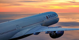 Delta Air Lines plane at sunset.